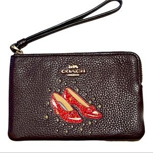 COACH Women’s Wizard of Oz Red Slippers Leather Zipper Wristlet Brown